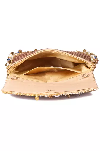 Gold evil eye clutch