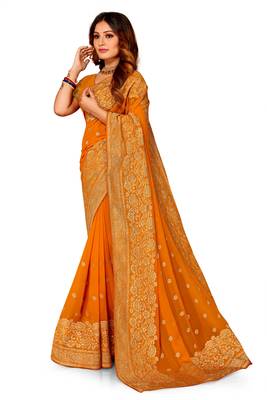 Mustard heavy zari embroidery border work georgette party wear with blouse 1