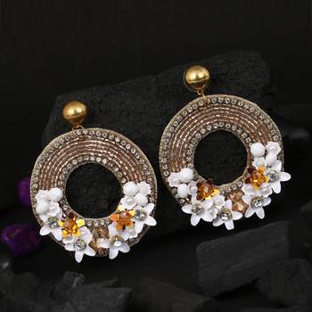 Women white and gold flower with stone-studded circular earrings 2