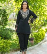 black embroidered shirt and trouser co ords