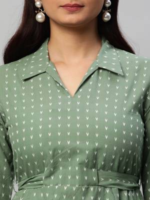 A statement dobby fabric co-ord set with collar and belt. 4
