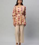 A printed co-ord with the scrunching detail at waist.