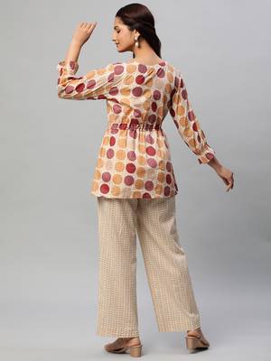 A printed co-ord with the scrunching detail at waist. 2