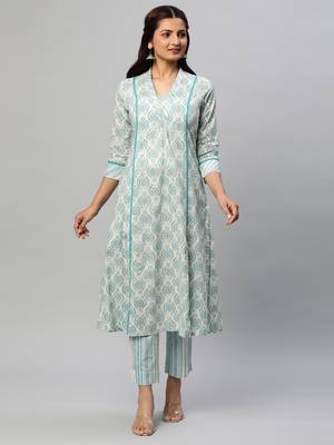 A line printed cotton v neck kurta with lace detailing paired with self striped pant. 1