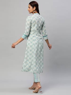 A line printed cotton v neck kurta with lace detailing paired with self striped pant. 2