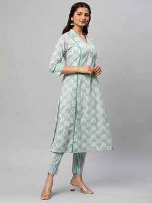 A line printed cotton v neck kurta with lace detailing paired with self striped pant. 3