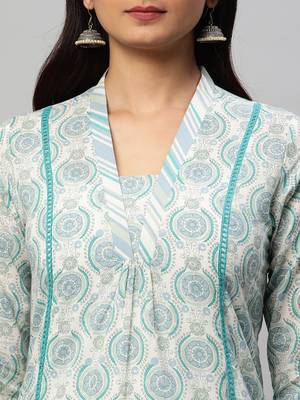 A line printed cotton v neck kurta with lace detailing paired with self striped pant. 4