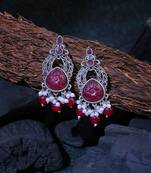 Oxidised red stone-studded pearl-tessel drop earrings