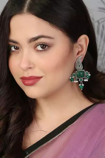 Oxidised green stone-studded pearl-tessel drop earrings