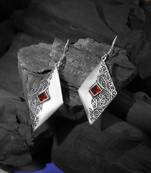 Silver-plated red stone-studded earrings