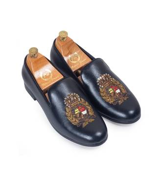 Black regal crest slipons 1
