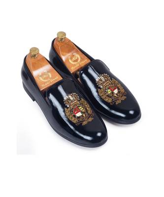 Patent black regal crest slipons 1