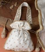 dangle off white & gold harlequin embroidered faux silk potli