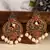 Mesmerizing red kemp stone pearls drop chandbalis traditional antique gold look drop earrings for women and girls