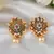 Traditional antique gold look red stone earrings embellished with pearls for women and girls