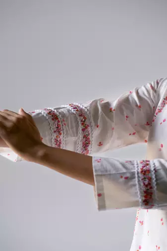 White Bougainvillea Cotton Printed Salwar Suit With Embroidery and Lace Detailing on Sleeves