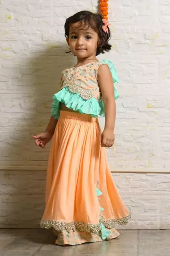 Peach and aqua green heavy embroidered ghagara set