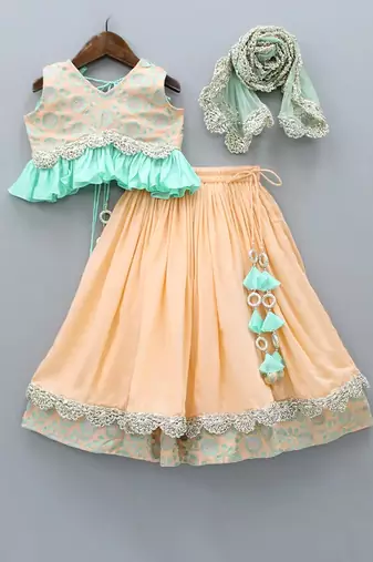 Peach and aqua green heavy embroidered ghagara set