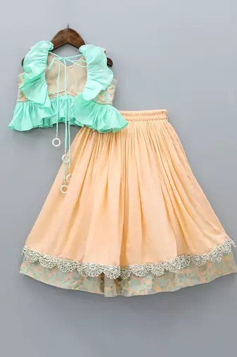 Peach and aqua green heavy embroidered ghagara set