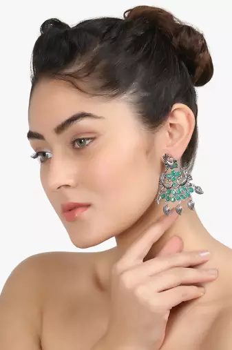 Women silver-plated peacock shapped stone-studded earrings