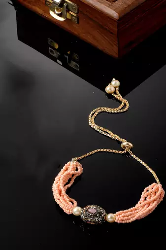 Peach & black adjustable bracelet with kundan & american diamond