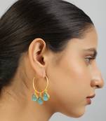 Contemporary gold hoop earrings