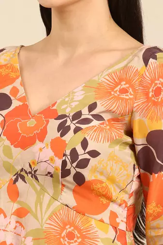 Orange printed muslin v neck dress