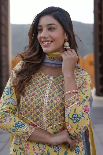 women yellow floral straight kurta pant and dupatta set