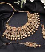 Traditonal Gold Plated Gold Stone Studded Choker with Earring Maagtika