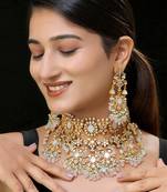 White gold finish kundan and mother of pearls necklace set