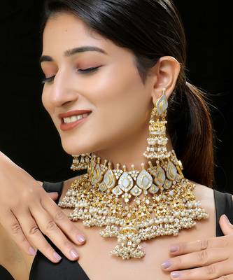 Gold finish kundan and mother of pearls necklace set 1