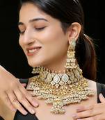 Gold finish kundan and mother of pearls necklace set