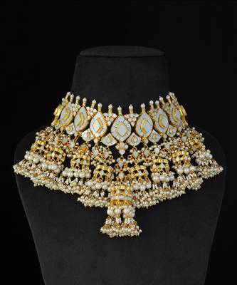 Gold finish kundan and mother of pearls necklace set 2