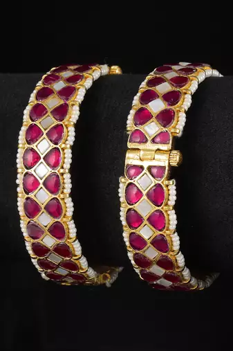 Red gold finish kundan mother of pearl bangles