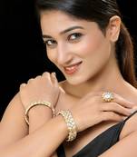 White gold finish kundan mother of pearl bangles