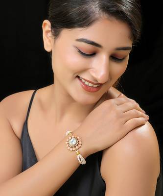 Peach gold finish kundan bracelet 1