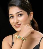 Green gold finish kundan pochi