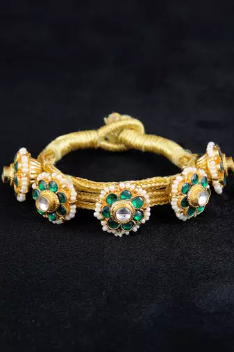 Green gold finish kundan pochi