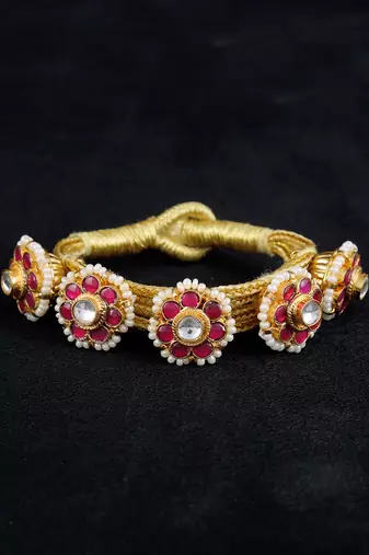Red gold finish kundan pochi