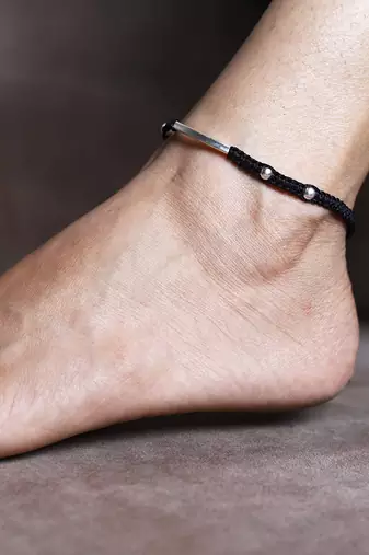 Black thread & silver anklets