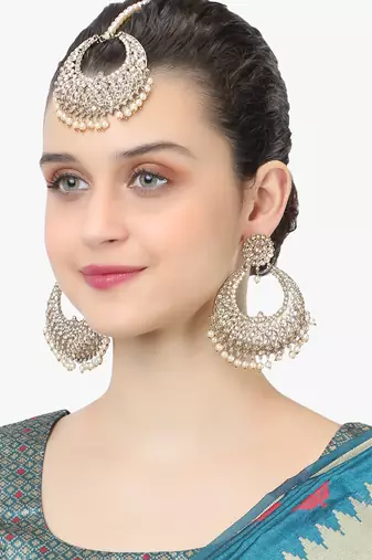 Gold-plated handcrafted yellow maang tikka with earrings
