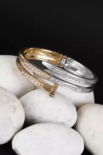 Women gold plated stone studded layered bracelet