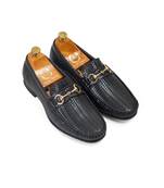 Textured buckle slipons