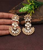 Gold color kundan earrings
