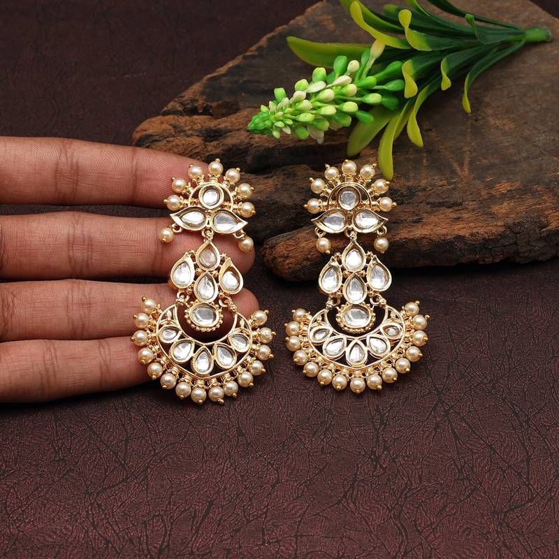 Gold color kundan earrings
