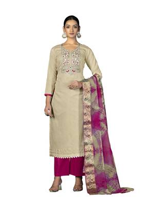 Women's beige embroidered,moti work with banarasi dupatta cambric cotton dress material 1