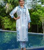  blue and white floral print tunic and trouser co ords