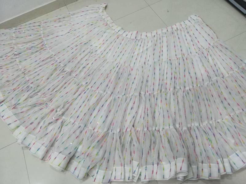 Splendid White Sequins Embroidered Georgette Holi Special Lehenga