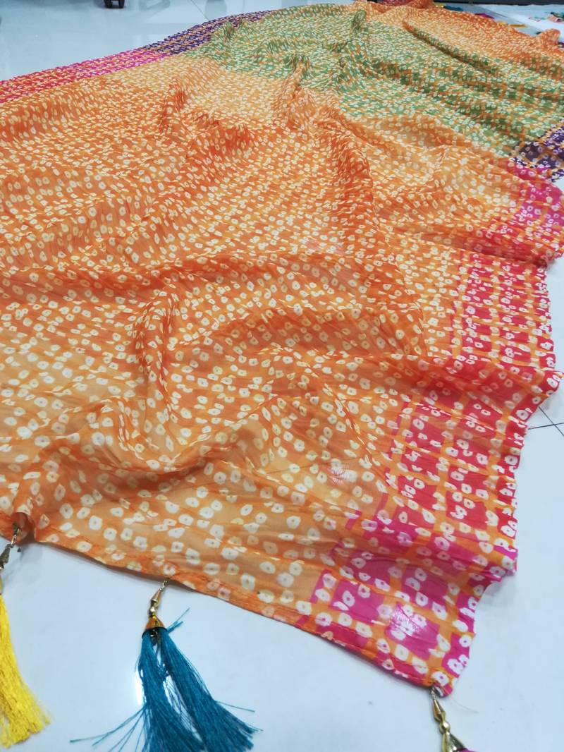 Splendid White Sequins Embroidered Georgette Holi Special Lehenga