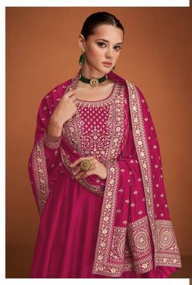 Rani pink silk blend anarkali semi stitched gowns 2